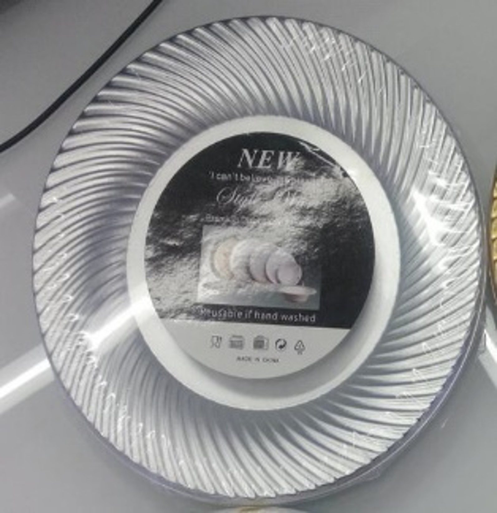 7" SILVER PLASTIC PLATE W/SWIRL DESIGN