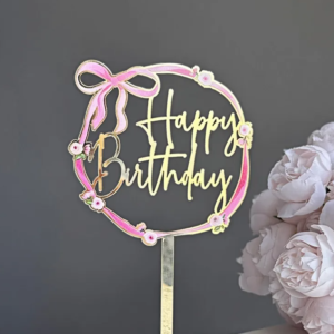 HBD TOPPER - GOLD W/PINK BOW LEFT SIDE